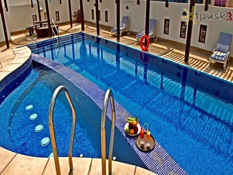 Фото отеля Arcadia Hotel Apartments 4* Дубай ОАЭ экстерьер и бассейны