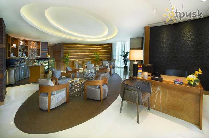 Фото отеля Tryp by Wyndham Abu Dhabi 4* Абу Даби ОАЭ лобби и интерьер