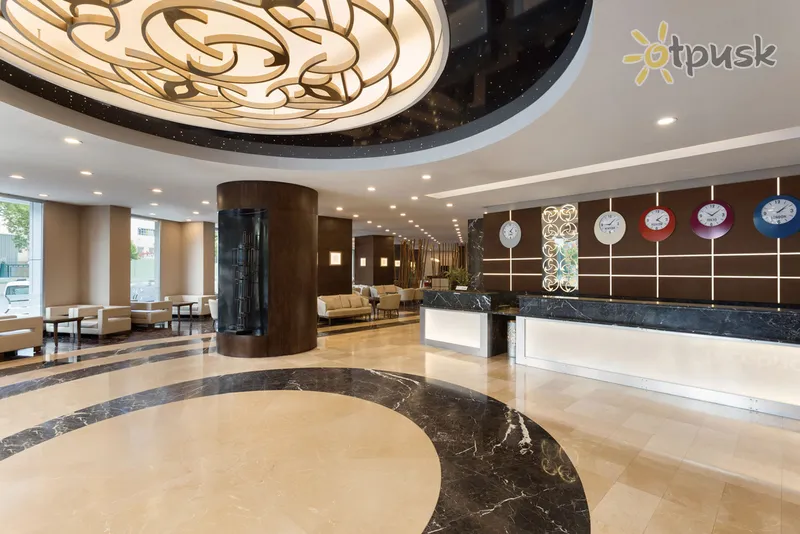 Фото отеля Ramada Plaza by Wyndham Izmir 4* Измир Турция лобби и интерьер