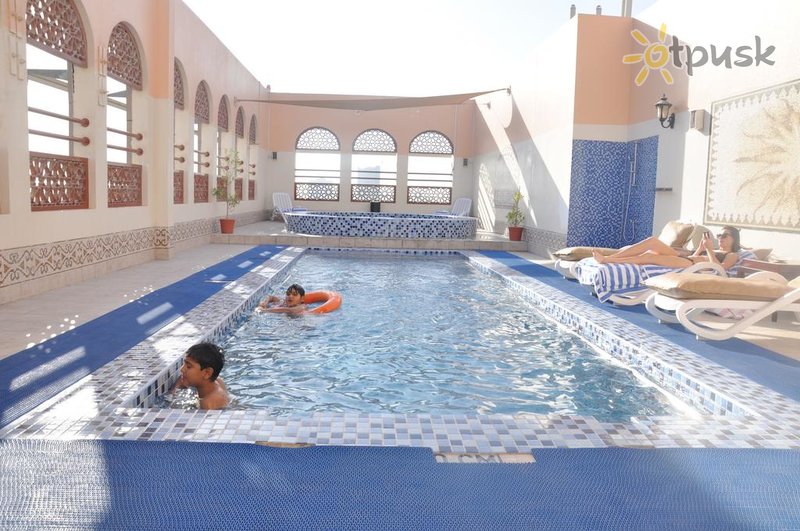 Фото отеля Ewan Ajman Suites Hotel 3* Аджман ОАЭ экстерьер и бассейны