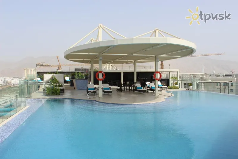 Фото отеля Grand Millennium Muscat 4* Muskatas Omanas išorė ir baseinai