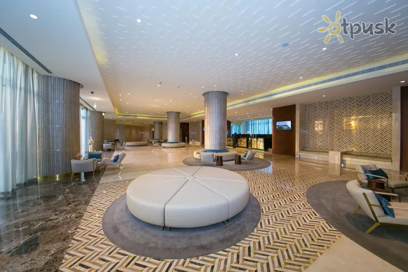 Фото отеля Grand Millennium Muscat 4* Muskatas Omanas fojė ir interjeras