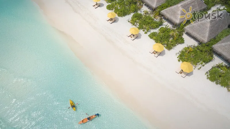 Фото отеля Dhigufaru Island Resort 5* Баа Атолл Мальдивы пляж