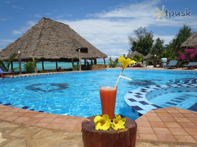 Фото отеля Queen of Sheba Beach Lodge 3* Понгве Танзания экстерьер и бассейны