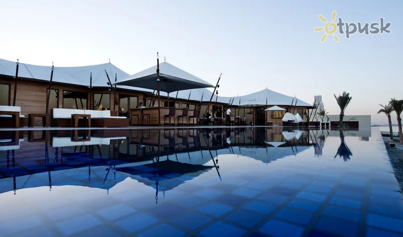 Фото отеля The Ritz-Carlton Ras Al Khaimah, Al Hamra Beach 5* Rasalhaima AAE ārpuse un baseini
