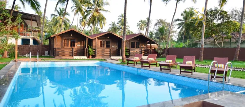 Фото отеля MAP5 Village Resort 3* Šiaurės Goa Indija išorė ir baseinai