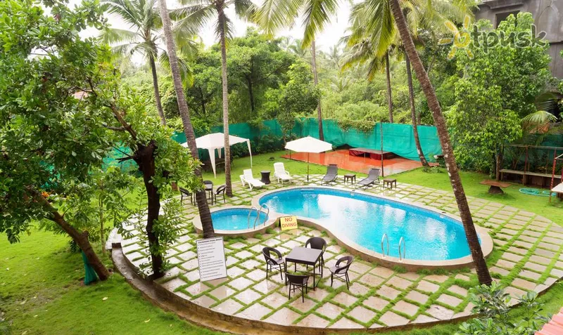 Фото отеля Treebo Martins Siesta 3* Північний Гоа Індія екстер'єр та басейни