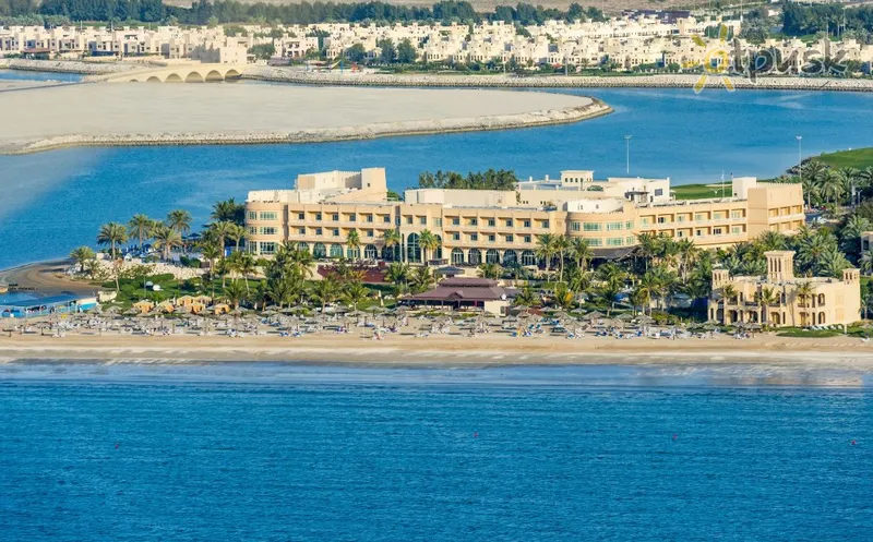 Фото отеля Hilton Al Hamra Beach & Golf Resort 5* Рас Аль-Хайма ОАЕ екстер'єр та басейни