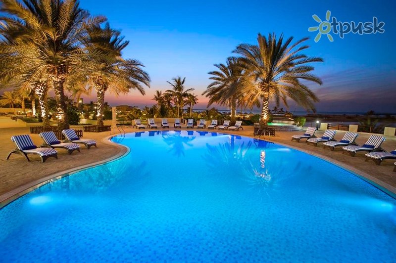 Фото отеля Hilton Al Hamra Beach & Golf Resort 5* Рас Аль-Хайма ОАЭ экстерьер и бассейны