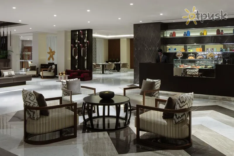 Фото отеля Pullman Dubai Creek City Centre Residences 5* Дубай ОАЕ лобі та інтер'єр