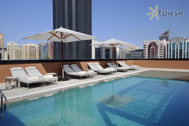 Фото отеля Courtyard by Marriott World Trade Center Abu Dhabi 4* Abu dabī AAE ārpuse un baseini