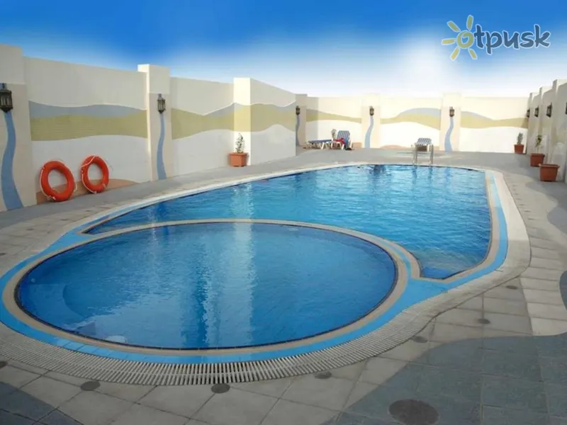 Фото отеля Al Jawhara Gardens Hotel 4* Дубай ОАЕ екстер'єр та басейни