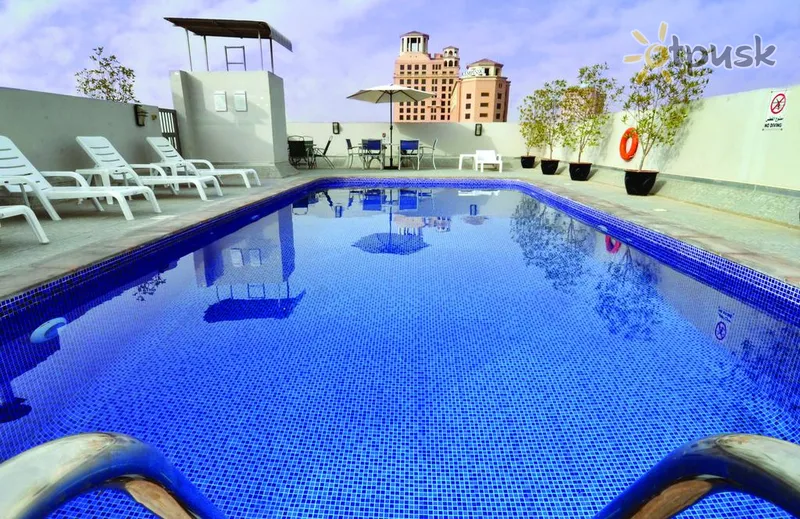 Фото отеля Auris Boutique Hotel Apartments 4* Дубай ОАЭ экстерьер и бассейны