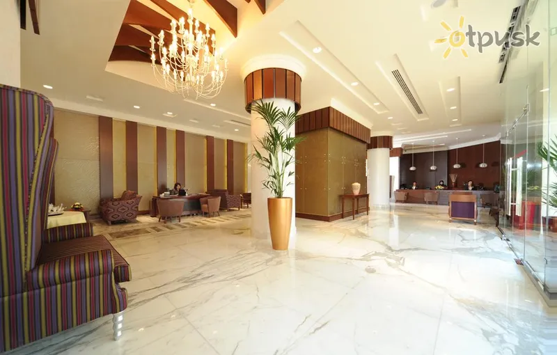 Фото отеля City Seasons Al Hamra Abu Dhabi 4* Абу Дабі ОАЕ лобі та інтер'єр