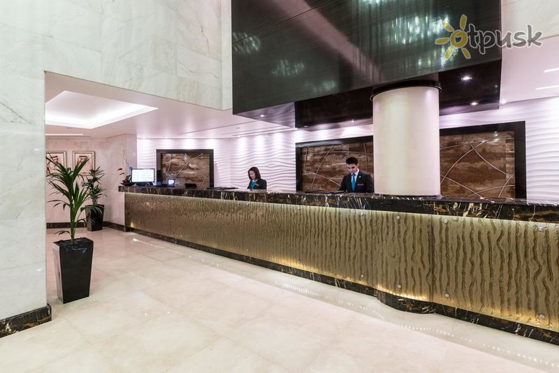Фото отеля Crowne Plaza Abu Dhabi 5* Абу Даби ОАЭ лобби и интерьер