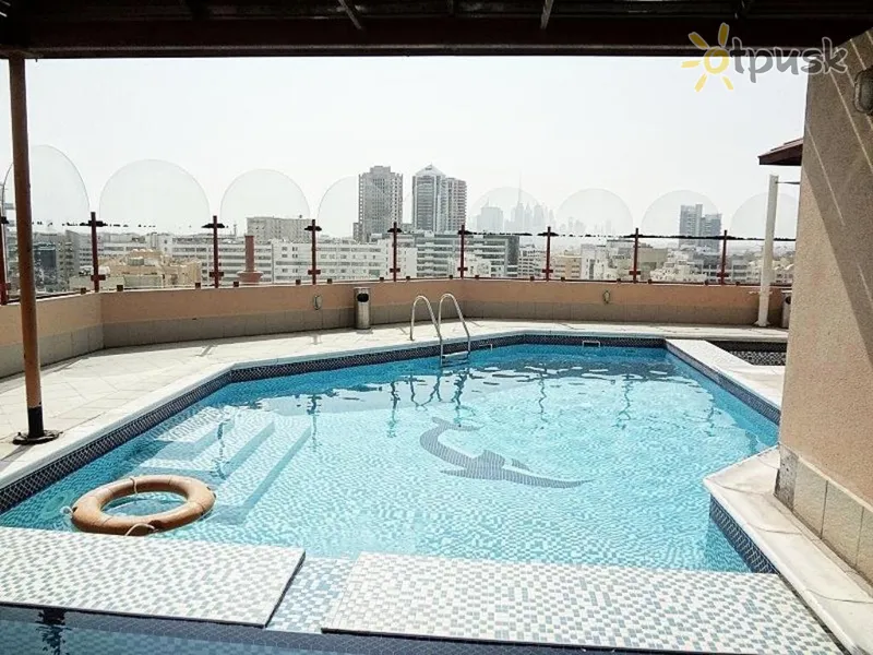 Фото отеля Dolphin Hotel Apartments 3* Дубай ОАЭ экстерьер и бассейны