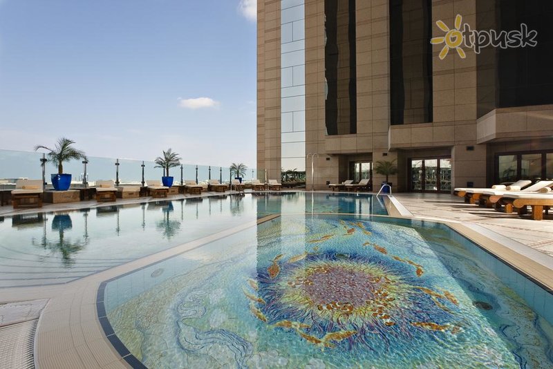 Фото отеля Fairmont Dubai 5* Дубай ОАЭ экстерьер и бассейны
