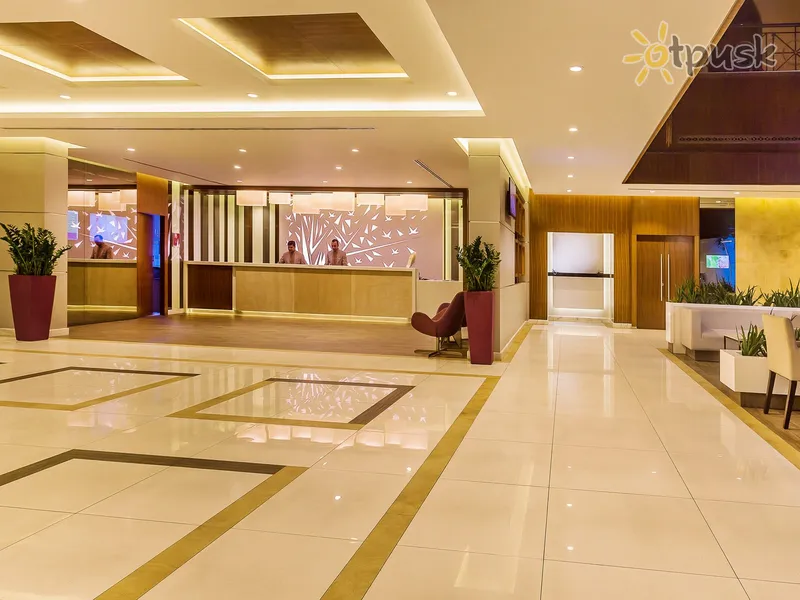 Фото отеля Flora Grand Hotel 4* Дубай ОАЭ лобби и интерьер