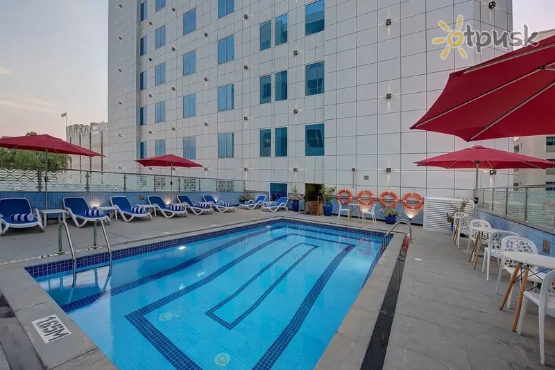 Фото отеля Omega Hotel Dubai 4* Дубай ОАЭ экстерьер и бассейны