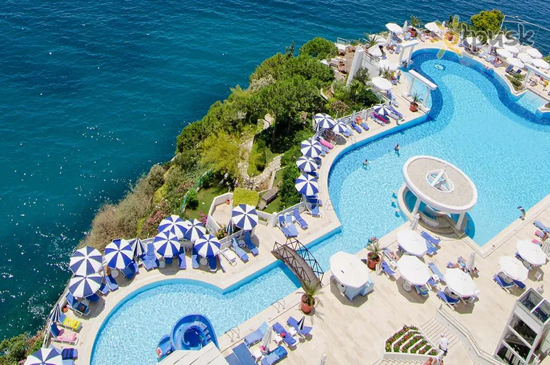 Фото отеля Korumar Hotel De Luxe 5* Kusadasi Turcija ārpuse un baseini
