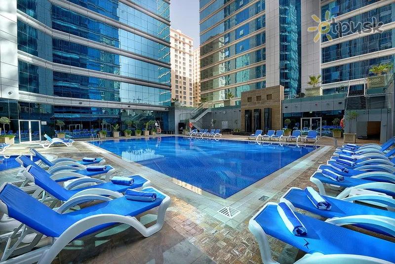 Фото отеля The Ghaya Grand Hotel 5* Дубай ОАЭ экстерьер и бассейны