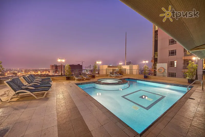 Фото отеля Grandeur Hotel 4* Дубай ОАЭ экстерьер и бассейны