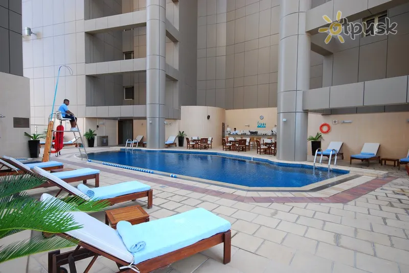 Фото отеля Grand Millennium Dubai 5* Дубай ОАЕ екстер'єр та басейни