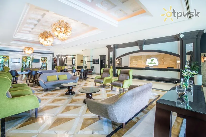 Фото отеля Holiday Inn Bur Dubai Embassy District 4* Дубай ОАЭ лобби и интерьер