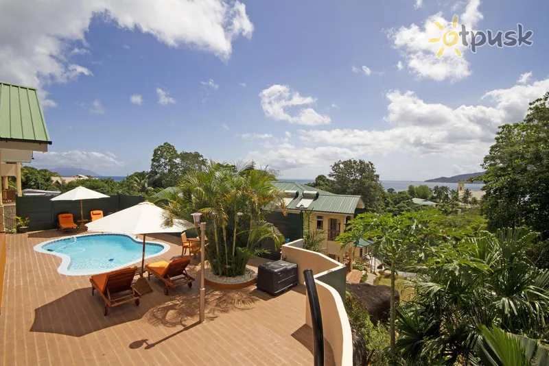 Фото отеля The Palm Seychelles 4* par. Mahe Seišelu salas ārpuse un baseini