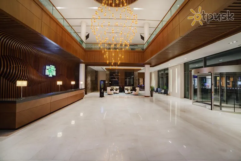 Фото отеля Holiday Inn Baku 4* Баку Азербайджан лобби и интерьер
