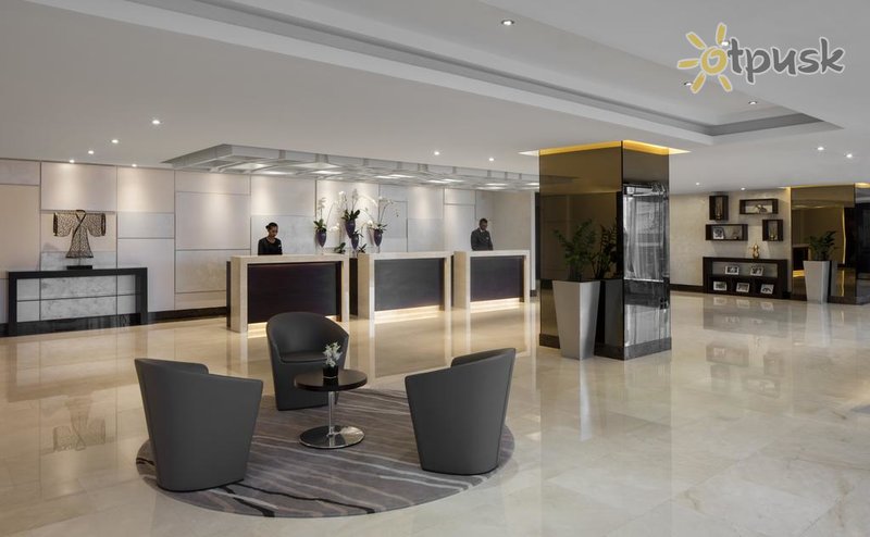 Фото отеля Jumeira Rotana Dubai 4* Дубай ОАЭ лобби и интерьер