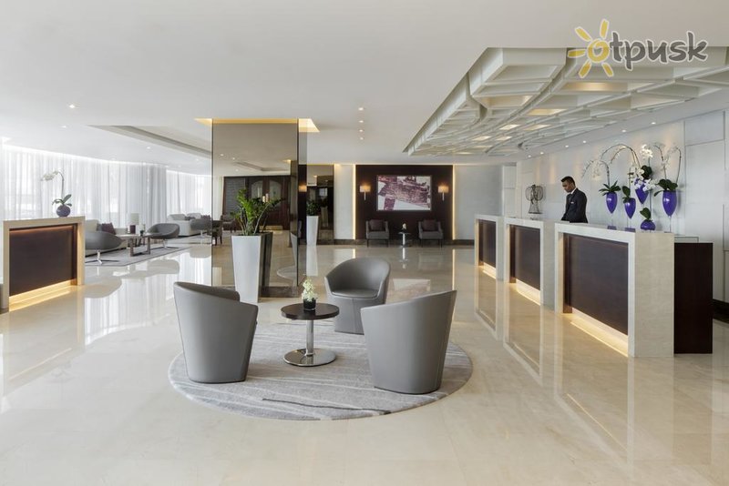 Фото отеля Jumeira Rotana Dubai 4* Дубай ОАЭ лобби и интерьер