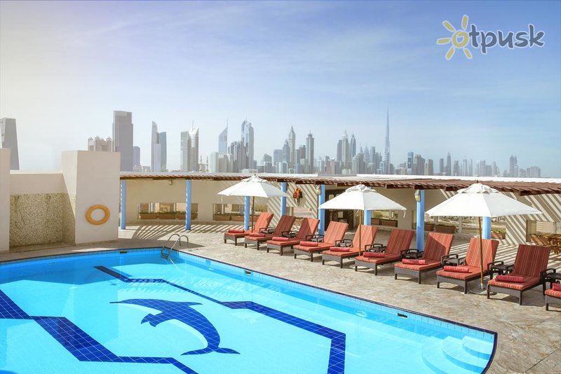 Фото отеля Jumeira Rotana Dubai 4* Дубай ОАЭ экстерьер и бассейны
