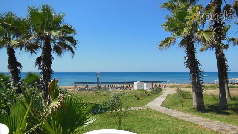 Фото отеля Nergos Garden Hotel 4* Сиде Турция пляж