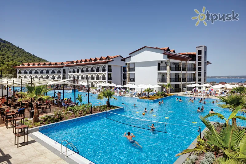 Фото отеля Ramada Resort by Wyndham Akbuk 4* Дидим Турция экстерьер и бассейны