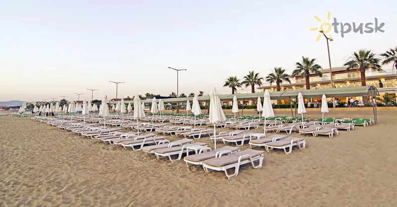 Фото отеля Palm Wings Kusadasi Beach Resort & Spa 5* Кушадасы Турция пляж