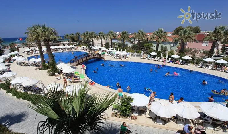 Фото отеля Palm Wings Kusadasi Beach Resort & Spa 5* Кушадаси Туреччина екстер'єр та басейни