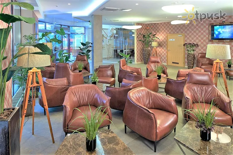 Фото отеля Wellton Riga Hotel 4* Рига Латвия лобби и интерьер