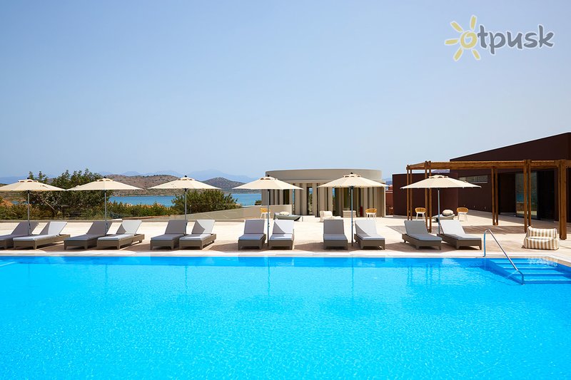 Фото отеля Domes of Elounda Autograph Collection 5* о. Крит – Элунда Греция экстерьер и бассейны
