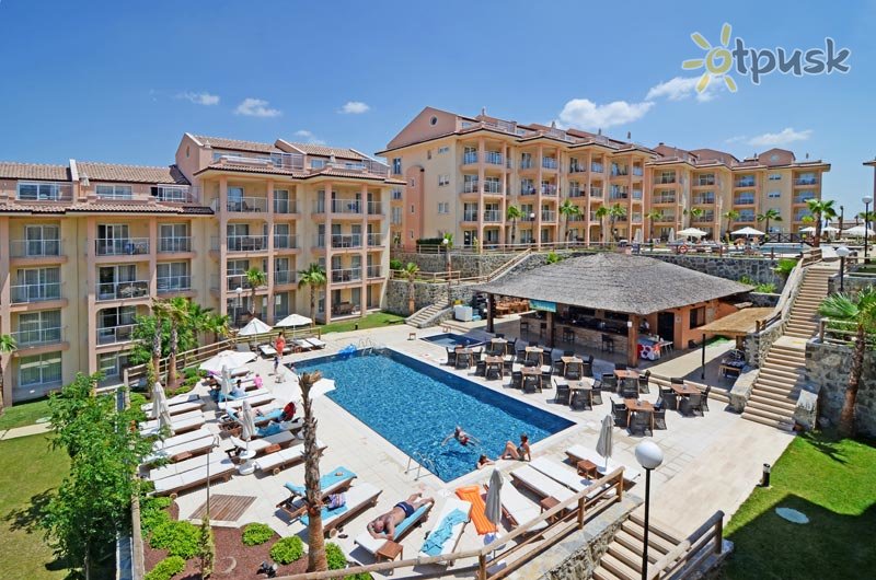 Фото отеля Wyndham Residences Kusadasi Golf & Spa 5* Кушадасы Турция экстерьер и бассейны