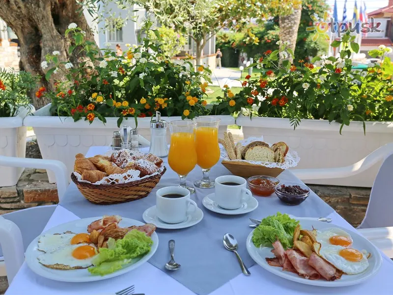 Фото отеля Dionysos Inn Hotel 3* Chalkidikė – Kasandra Graikija barai ir restoranai