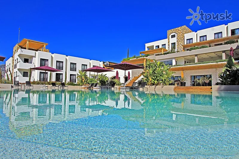 Фото отеля Ramada Resort by Wyndham Bodrum 5* Бодрум Турция экстерьер и бассейны