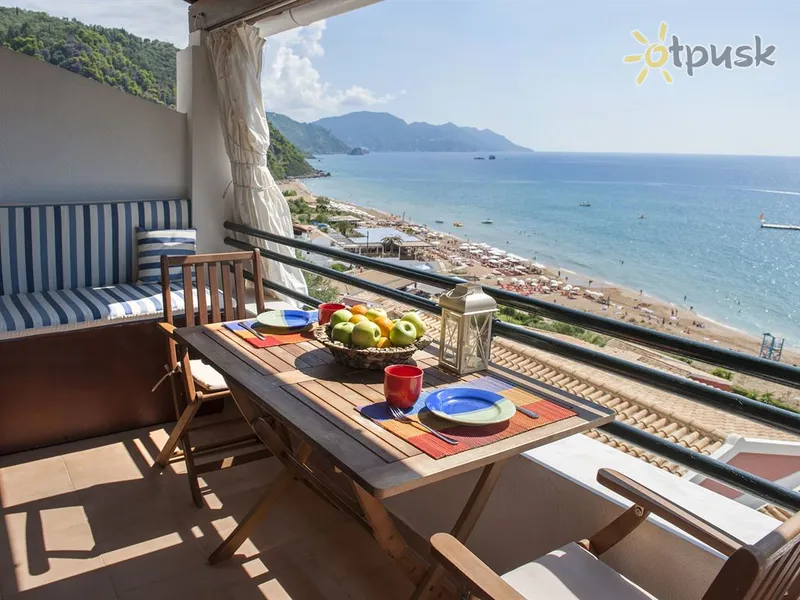 Фото отеля Glyfada Beachfront Apartments & Villas 3* Korfu Graikija kambariai