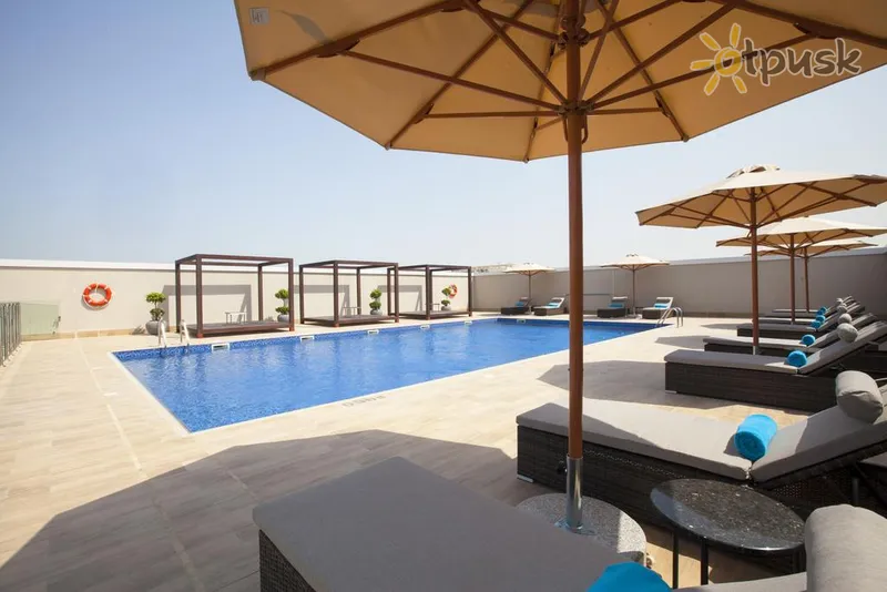 Фото отеля Flora Inn Hotel Dubai Airport 4* Dubajus JAE išorė ir baseinai