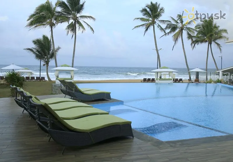 Фото отеля Avenra Beach Hotel 4* Хіккадува Шрі Ланка пляж