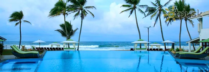 Фото отеля Avenra Beach Hotel 4* Хіккадува Шрі Ланка екстер'єр та басейни