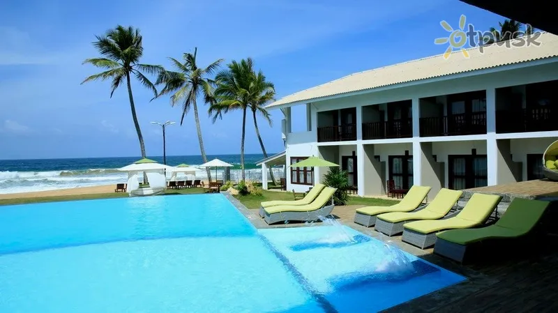 Фото отеля Avenra Beach Hotel 4* Hikaduva Šri Lanka papludimys