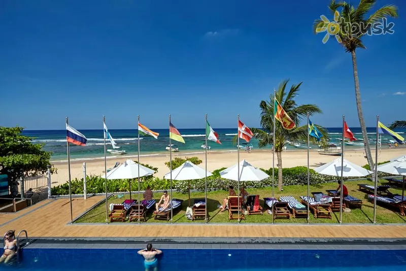 Фото отеля Coral Sands Hotel 3* Hikaduva Šri Lanka papludimys