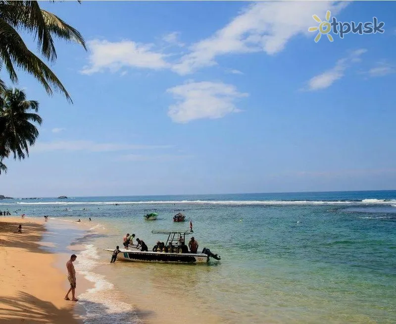 Фото отеля Hikkaduwa Beach Hotel 3* Хиккадува Шри-Ланка пляж