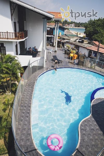 Фото отеля Neptune Bay Hotel 3* Унаватуна Шри-Ланка экстерьер и бассейны